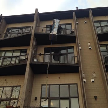 Olympia Moving & Storage - This was actually the most difficult part, getting it over the balcony railing. - Movers Near Me - Hyattsville, Maryland Olympia Moving & Storage - This was actually the most difficult part, getting it over the balcony railing. - Movers Near Me - Hyattsville, Maryland