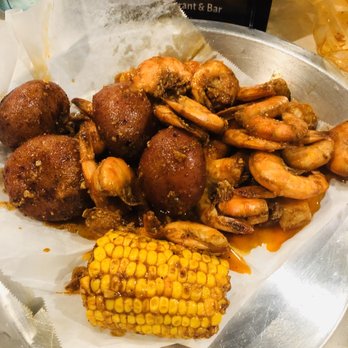 Fiery Crab Seafood Restaurant And Bar - Pound of shrimp with potatoes & corn - Seafood Near Me - Kenner, Louisiana Fiery Crab Seafood Restaurant And Bar - Pound of shrimp with potatoes & corn - Seafood Near Me - Kenner, Louisiana