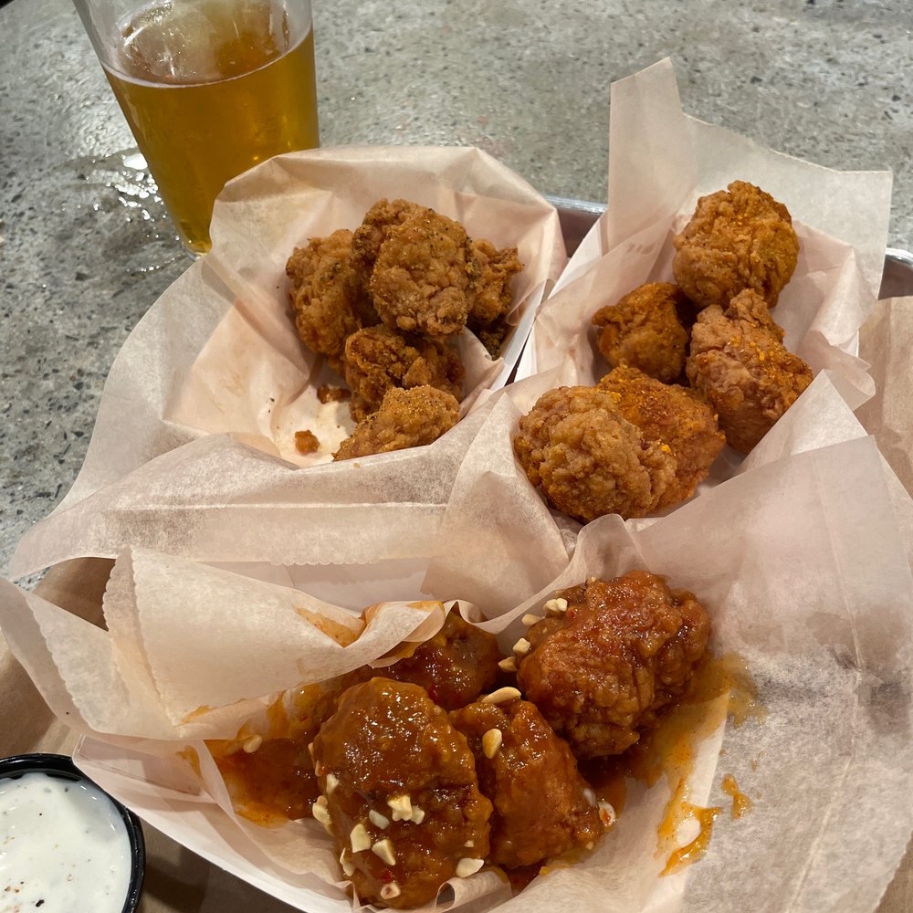 Fire Wings Bakersfield - Peanut butter (bottom) / Louisiana (top left) / Malayian Curry (top right) - Chicken Wings Near Me - Bakersfield, California Fire Wings Bakersfield - Peanut butter (bottom) / Louisiana (top left) / Malayian Curry (top right) - Chicken Wings Near Me - Bakersfield, California