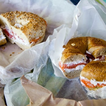 Bagel Schmagel - Tofu cream cheese and lox on an everything bagel (background) and on a whole wheat bagel (foreground). - Bagels Near Me - Brooklyn, New York Bagel Schmagel - Tofu cream cheese and lox on an everything bagel (background) and on a whole wheat bagel (foreground). - Bagels Near Me - Brooklyn, New York