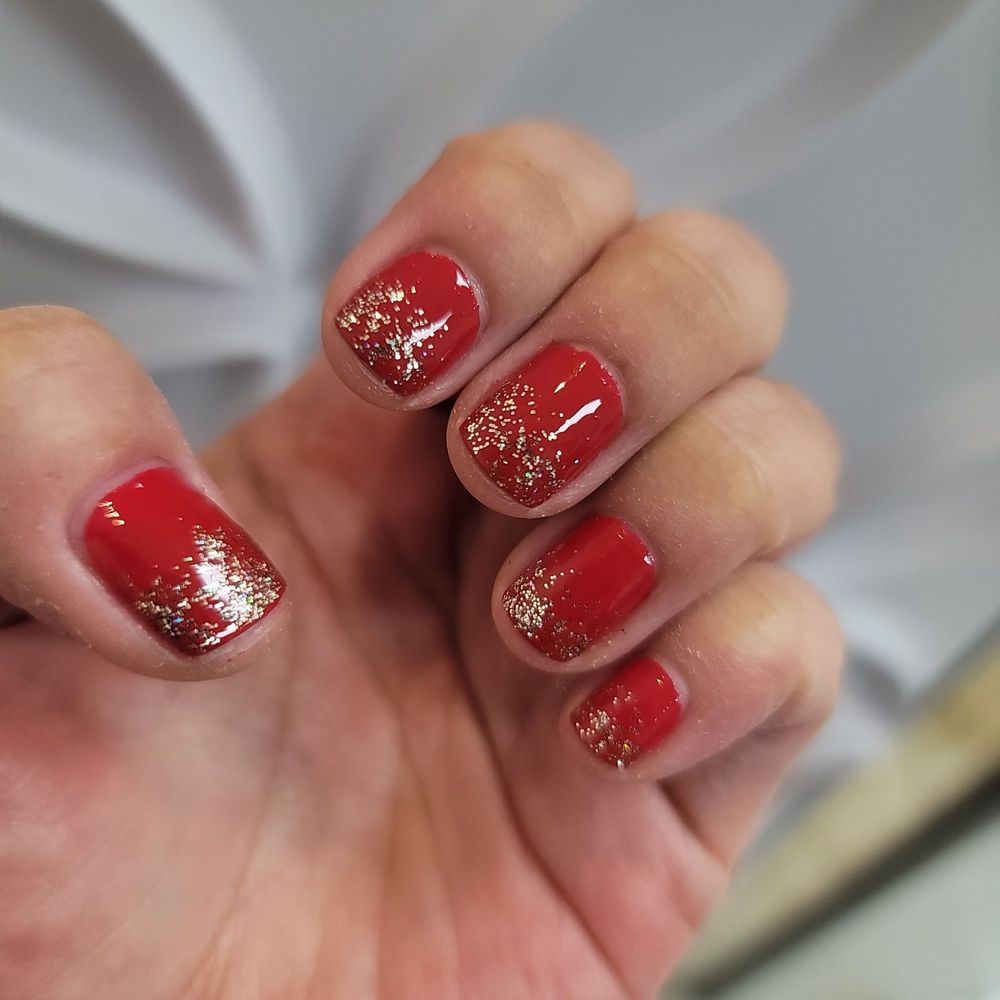 Basic manicure (free for the Yelp Elite event) but the gold glitter top coat was $5.. a bit pricey! Basic manicure (free for the Yelp Elite event) but the gold glitter top coat was $5.. a bit pricey!