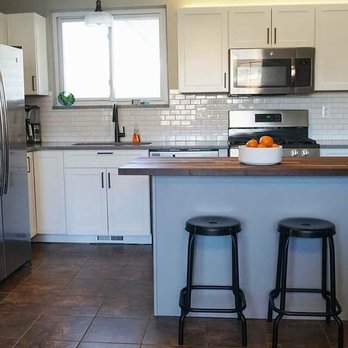 Granite Brothers - a kitchen with stainless steel appliances - Countertop Installation Near Me - Macomb Township, Michigan Granite Brothers - a kitchen with stainless steel appliances - Countertop Installation Near Me - Macomb Township, Michigan