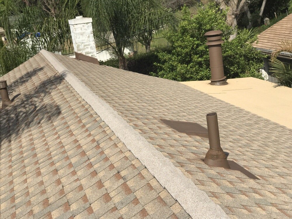 Slide of H&M ROOFING