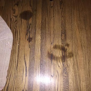 New Dark Spots On Our Hardwood Floor Under Next To Edge Of The