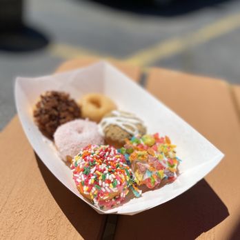 Donut Distillery - a tray of donuts with sprinkles - Donuts Near Me - Nashville, Tennessee