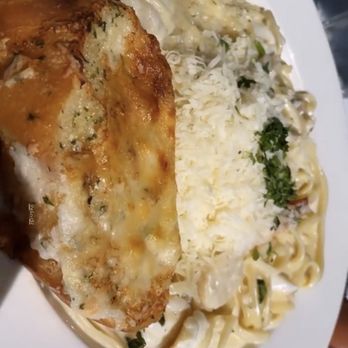 Tognazzini's Dockside - Cheesy garlic bread with seafood Alfredo pasta - Seafood Near Me - Morro Bay, California Tognazzini's Dockside - Cheesy garlic bread with seafood Alfredo pasta - Seafood Near Me - Morro Bay, California