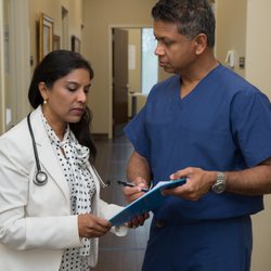 Center For Brain And Neurocare - Neurologist, Dr. Ruwani Gunawardane, consulting with Pain Management specialist, Dr. Vajira Gunawardane.