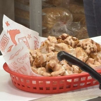 Urban Bird Hot Chicken - I'm not sure what this is but has a base of French Fries, then man-n-cheese, then chicken tenders chopped up with sauce all over the top. - Chicken Shop Near Me - Richmond, Texas Urban Bird Hot Chicken - I'm not sure what this is but has a base of French Fries, then man-n-cheese, then chicken tenders chopped up with sauce all over the top. - Chicken Shop Near Me - Richmond, Texas