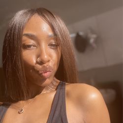A Blow Dry Bar - Hair washed and blown out straight before styling with hot tools.