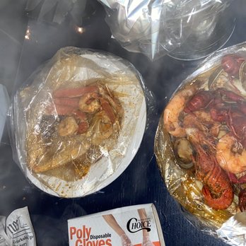 Twist Seafood Restaurant & Bar - seafood combo with gloves - Seafood Near Me - Brooklyn, New York Twist Seafood Restaurant & Bar - seafood combo with gloves - Seafood Near Me - Brooklyn, New York