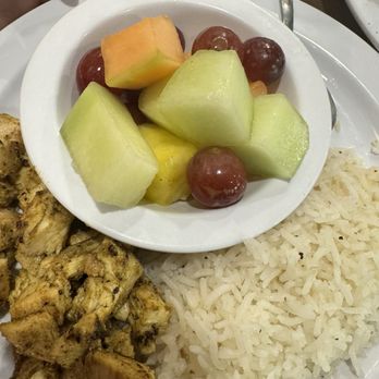 Taziki's Mediterranean Cafe - Northglenn - Kids chicken and rice with a fruit side. - Mediterranean Near Me - Denver, Colorado Taziki's Mediterranean Cafe - Northglenn - Kids chicken and rice with a fruit side. - Mediterranean Near Me - Denver, Colorado