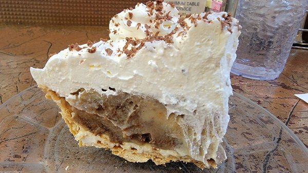 Photo of House of Pies - Houston, TX, US. Bayou Goo pie: The vanilla and chocolate custard was refreshing, they paired so well with the cream cheese layer on top!