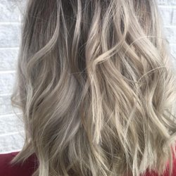 Kendra Bland - Cool blonde with a root smudge