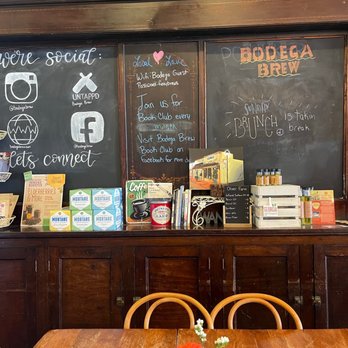 Bodega Brew - a table with a vase of flowers on it - Coffee & Tea Near Me - Perry, Georgia Bodega Brew - a table with a vase of flowers on it - Coffee & Tea Near Me - Perry, Georgia