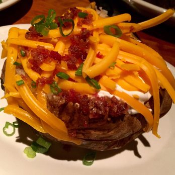 Houston's Restaurant - Loaded baked potato. - American Near Me - Hackensack, New Jersey Houston's Restaurant - Loaded baked potato. - American Near Me - Hackensack, New Jersey