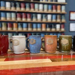 The Parlor City Brewing Company - Mugs of beer for Mug Club members.