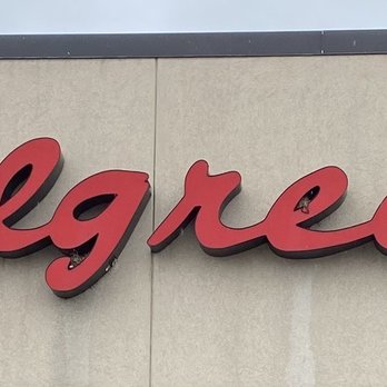 Walgreens - a walgrees sign on the side of a building - Drugstores Near Me - Cranston, Rhode Island