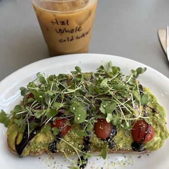 Lighthouse Coffee - Avocado toast. Iced coffee with hazelnut syrup. - Coffee & Tea Near Me - Santa Barbara, California