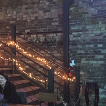 Circle City Brewing - a woman sitting at a table - Brewpubs Near Me - Dothan, Alabama