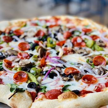 Protagonist Beer - a pizza with various toppings - Pizza Near Me - Charlotte, North Carolina