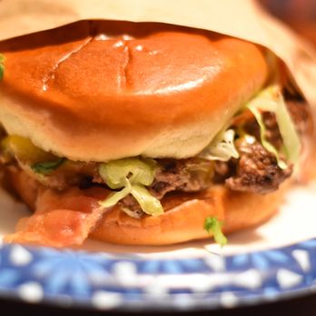 Guy Fieri's Flavortown Kitchen - Real Cheezy Burger with Bacon - Food Delivery Services Near Me Guy Fieri's Flavortown Kitchen - Real Cheezy Burger with Bacon - Food Delivery Services Near Me