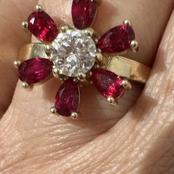 Garrett created this unique ring from a few sketches, using my mom's original diamond. Love it!!!
