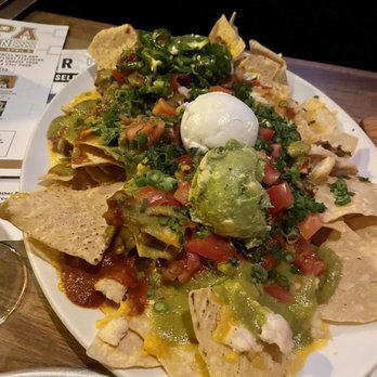 Yard House - Chicken Nachos** appetizer is huge! - New American Near Me - Virginia Beach, Virginia Yard House - Chicken Nachos** appetizer is huge! - New American Near Me - Virginia Beach, Virginia