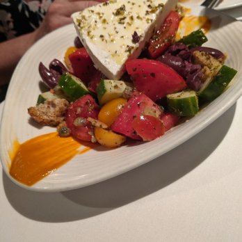 Nerai - Pre-Theater: Horiatiki- Greek tomato, feta, cucumber, onions, olives, tomato butter. Excellent, bottom was Dakos like with the barley. - Greek Near Me - New York, New York Nerai - Pre-Theater: Horiatiki- Greek tomato, feta, cucumber, onions, olives, tomato butter. Excellent, bottom was Dakos like with the barley. - Greek Near Me - New York, New York