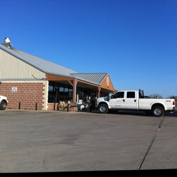 Circle H Shell - two trucks parked in front of a building - Convenience Stores Near Me - Santo, Texas Circle H Shell - two trucks parked in front of a building - Convenience Stores Near Me - Santo, Texas