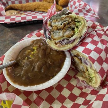 Sami’s Southern Kitchen & More - Po' boy with fried oysters and a side of red beans and rice. - Southern Near Me - Sapulpa, Oklahoma Sami’s Southern Kitchen & More - Po' boy with fried oysters and a side of red beans and rice. - Southern Near Me - Sapulpa, Oklahoma