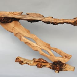 2 Griffins Design & Build / Fine Custom Woodworking - Z-table.  The leg is made from hand carved curly maple.  The top and bottom are slab cuts from a maple burl. Finished with hand rubbed oil.