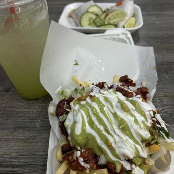 Coyote Taqueria - 1/2 of fries with adobada - Mexican Near Me - Menifee, California Coyote Taqueria - 1/2 of fries with adobada - Mexican Near Me - Menifee, California