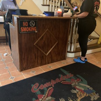 Compadres Mexican Restaurant - a woman standing at the counter - Mexican Near Me - Grove City, Pennsylvania