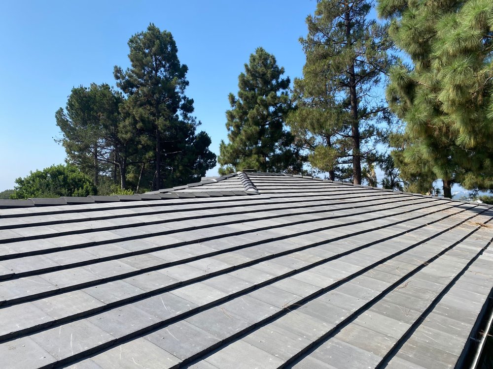 Slide of United Frontier Roofing