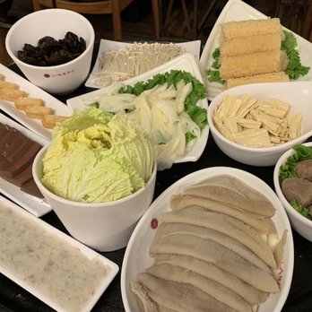 Shancheng Lameizi Hot Pot - L to R: Shrimp Paste, Duck Blood, Fish Tofu, Woodear & Enoki Mushrooms, Bean Curd Roll & Stick, Beef Ball, Beef Tripe, Duck Feet, Napa - Hot Pot Near Me - Milpitas, California Shancheng Lameizi Hot Pot - L to R: Shrimp Paste, Duck Blood, Fish Tofu, Woodear & Enoki Mushrooms, Bean Curd Roll & Stick, Beef Ball, Beef Tripe, Duck Feet, Napa - Hot Pot Near Me - Milpitas, California