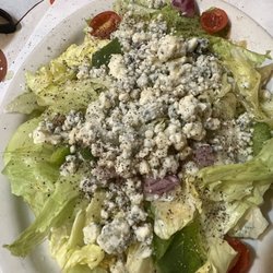 Side salad with homemade dressing and yummy bleu cheese.