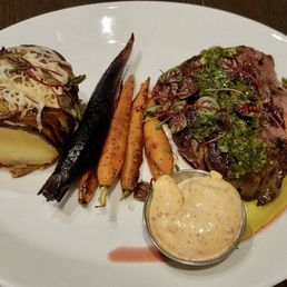 New York Strip Steak with Potato and Carrots. New York Strip Steak with Potato and Carrots.