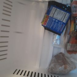 Advanced Appliance Tech - This picture was taken after he supposedly fixed our refrigerator. Food unthoughling and fridge still not cooling