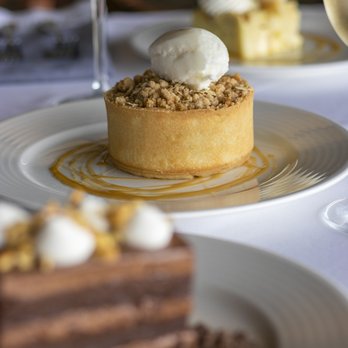 Geneva Chophouse - a dessert and a glass of wine - Steakhouses Near Me - Lake Geneva, Wisconsin Geneva Chophouse - a dessert and a glass of wine - Steakhouses Near Me - Lake Geneva, Wisconsin