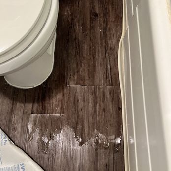 Woodcliff Apartment Homes - Toilet floor boards flooding with water - Apartments Near Me - Los Angeles, California Woodcliff Apartment Homes - Toilet floor boards flooding with water - Apartments Near Me - Los Angeles, California