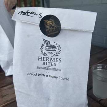 Hermes Bites - Each entree with side arrived in a take-out bag and was accompanied by a wooden plate. - Sandwiches Near Me - Washington, DC, District of Columbia