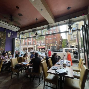 Carmelina's - Half of the dining room. Picture taken from a 4 top table in middle of restaurant - Italian Near Me - Boston, Massachusetts