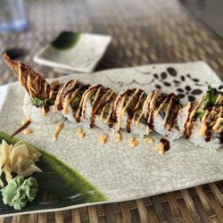 Water Lily Japanese Cuisine - Spider roll with fried soft shell crab, cucumbers, avocado, spicy mayo and eel sauce.