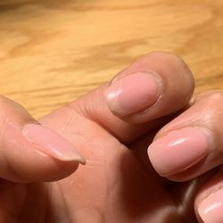 Raquelle Nail Bar - Nails after only 8 days. Simple pink coat, cut, and shaping request at appointment.