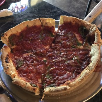Gusano's Pizza - Signature Spinach Chicago Style with fresh basil. Fabulous!! - Pizza Near Me - Rogers, Arkansas Gusano's Pizza - Signature Spinach Chicago Style with fresh basil. Fabulous!! - Pizza Near Me - Rogers, Arkansas