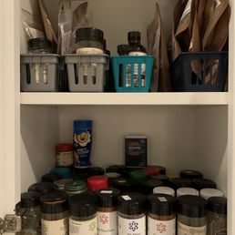 a shelf full of spices