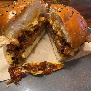 Fusion Grill & Bar - Texas Burger, patty, pulled pork, grilled onions, jalepenos, american cheese, and chipotle sauce. - Burgers Near Me - Katy, Texas Fusion Grill & Bar - Texas Burger, patty, pulled pork, grilled onions, jalepenos, american cheese, and chipotle sauce. - Burgers Near Me - Katy, Texas