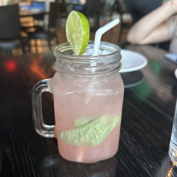 River: A Waterfront Restaurant & Bar - a pink drink with a lime slice in a mason jar - Steakhouses Near Me - Wethersfield, Connecticut River: A Waterfront Restaurant & Bar - a pink drink with a lime slice in a mason jar - Steakhouses Near Me - Wethersfield, Connecticut