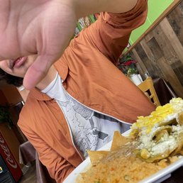 Son being funny, with his chilaquiles Son being funny, with his chilaquiles