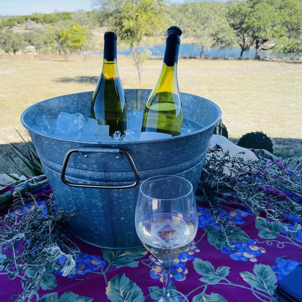 Diamond Vineyards - two bottles of wine and a glass of wine - Wineries Near Me - Fredericksburg, Texas